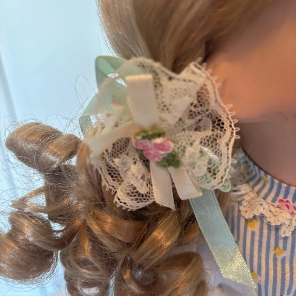Charming Blue and White Porcelain Doll with Curly Hair - Picture 4 of 11
